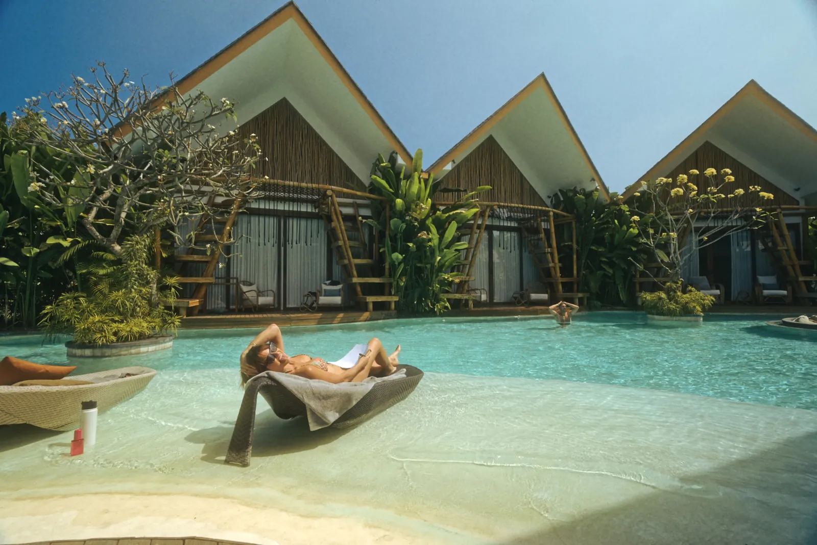 Poolside bungalows at the private Bali villa